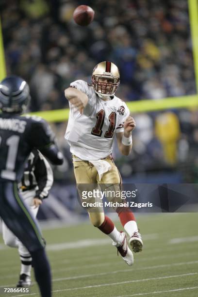 Alex Smith of the San Francisco 49ers passes the ball during the game against the Seattle Seahawks at Qwest Field on December 14, 2006 in Seattle,...