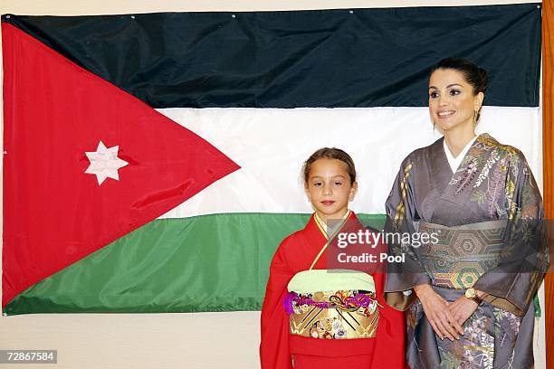 Queen Rania of Jordan and daughter Princess Iman pose at the Sodo Kimono Academy on December 22, 2006 in Tokyo. Queen Rania of Jordan is in Japan for...