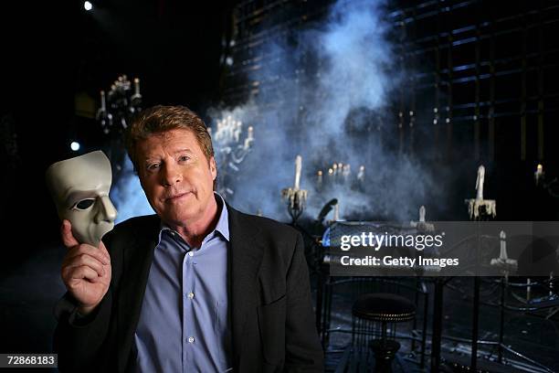 Actor Michael Crawford poses for a portrait to promote television documentary "The Phantom of the Opera - Behind the Mask" on set at the Her...