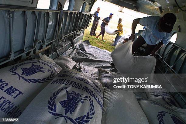 Villagers pack relief supplies into a helicopter at Malindi December 2006 to be flown to drought ravaged Gaarsen in Tana River district where atleast...