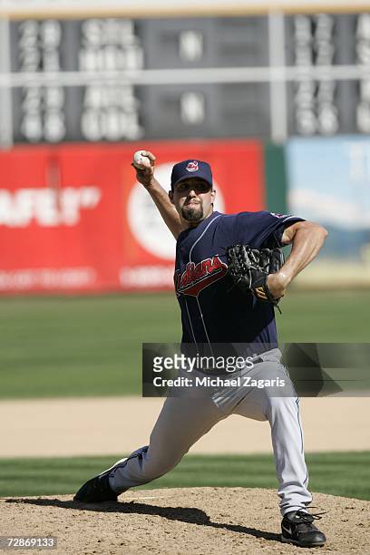 Andrew Brown of the Cleveland Indians pitches during the game against the Oakland Athletics at the McAfee Coliseum in Oakland, California on...