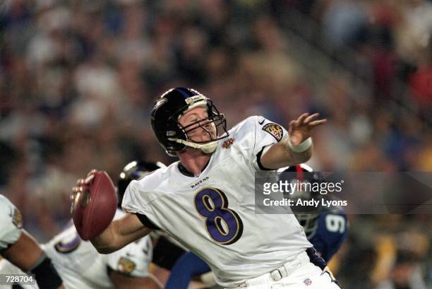 Trent Dilfer of the Baltimore Ravens lines up a throw during the Super Bowl XXXV Game against the New York Giants at the Raymond James Stadium in...
