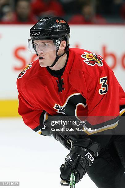 Dion Phaneuf of the Calgary Flames skates against the Minnesota Wild during their NHL game at Pengrowth Saddledome in Calgary, Alberta, Canada. The...