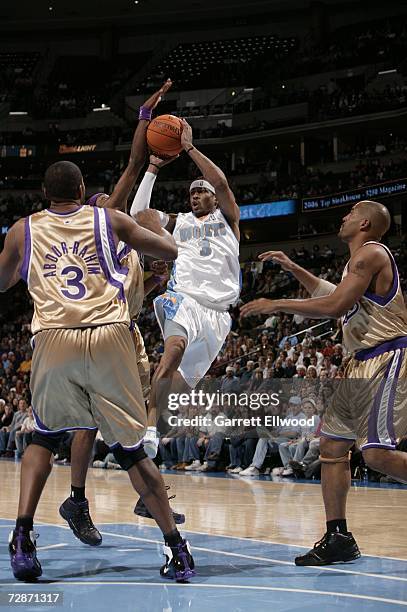 Allen Iverson of the Denver Nuggets passes during the game against the Sacramento Kings on December 22, 2006 at the Pepsi Center in Denver, Colorado....