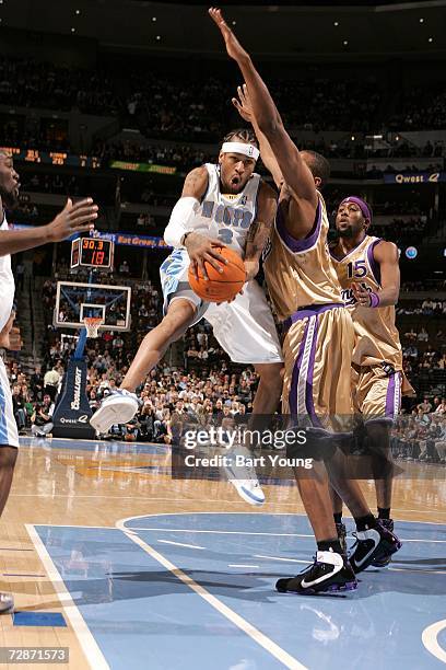 Allen Iverson of the Denver Nuggets goes to the basket against the Sacramento Kings at the Pepsi Center on December 22, 2006 in Denver, Colorado....