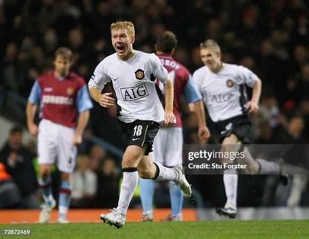 Manchester United player Paul Scholes wheels away after his goal during the Barclays Premiership match between Aston Villa and Manchester United at...