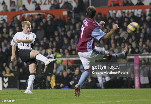 Paul Scholes of Manchester United scores the second goal during the Barclays Premiership match between Aston Villa and Manchester United at Villa...