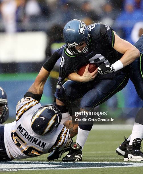 Linebacker Shawne Merriman of the San Diego Chargers sacks quarterback Matt Hasselbeck of the Seattle Seahawks on December 24, 2006 at Qwest Field in...