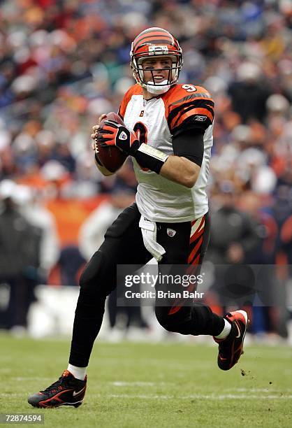 Quarterback Carson Palmer of the Cincinnati Bengals rolls out to throw against the Denver Broncos in the first quarter on December 24, 2006 at...