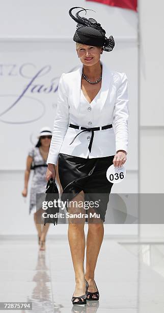 Lorraine Cookson of Karaka walks down the catwalk during the Fashion in the Field at the New Zealand Herald Christmas Carnival Boxing Day races at...