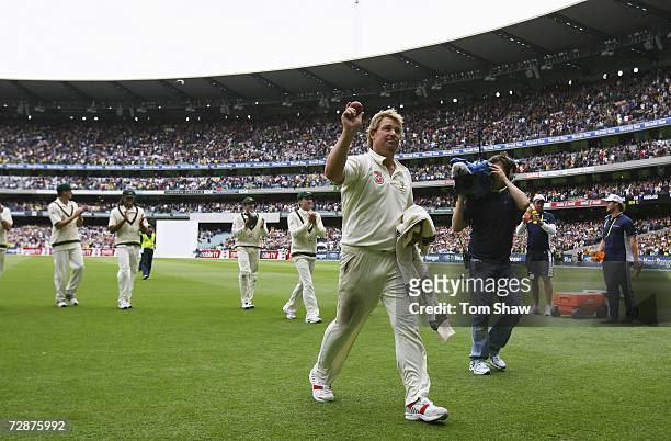 Shane Warne of Australia leaves the field after taking 5 wickets, including his 700th test wicket, during day one of the fourth Ashes Test Match...
