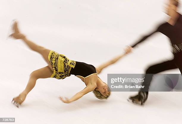 Kristy Sargeant-Wirtz and Kris Wirtz of Canada perform a death spiral during the Pairs Short Program of the 2001 Four Continents Championships at the...