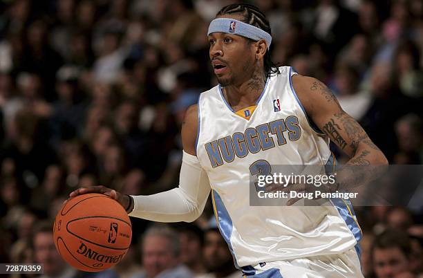 Allen Iverson of the Denver Nuggets brings the ball upcourt against the Boston Celtics as the Nuggets defeated the Celtics 116-105 during a NBA Game...