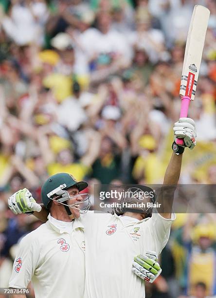 Andrew Symonds of Australia celebrates his maiden Test century with team mate Matthew Hayden during day two of the fourth Ashes Test Match between...