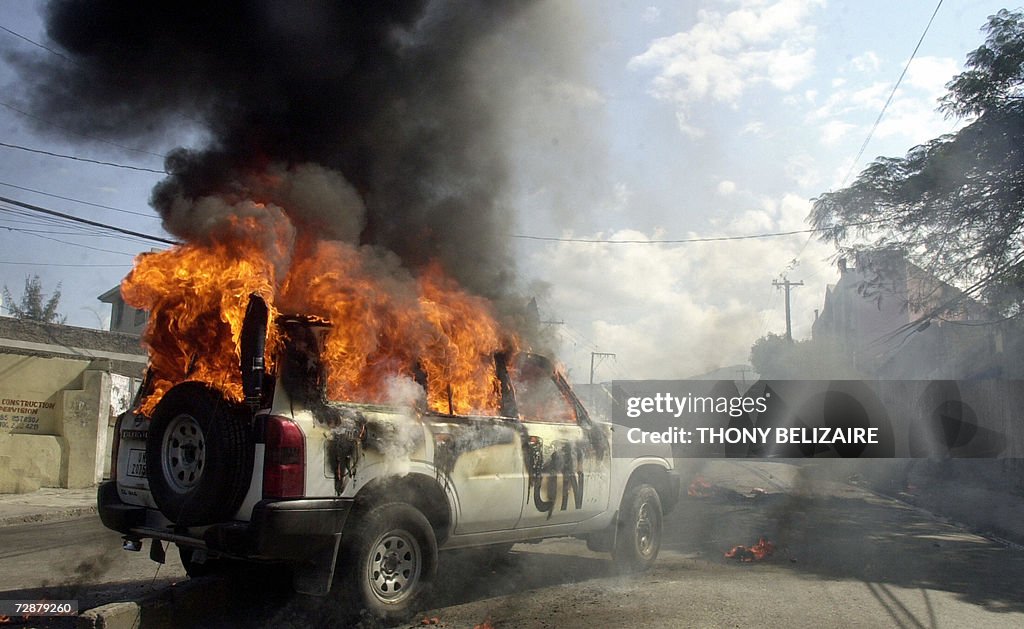A UN mission car is burned 20 December,