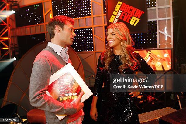 Getting ready for the big one....Ryan Seacrest and Fergie chat at rehearsals for "Dick Clark's New Year's Rockin' Eve 2007" which airs December 31 on...