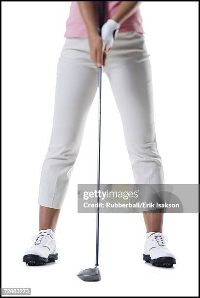 female golfer - golf club white background stock pictures, royalty-free photos & images