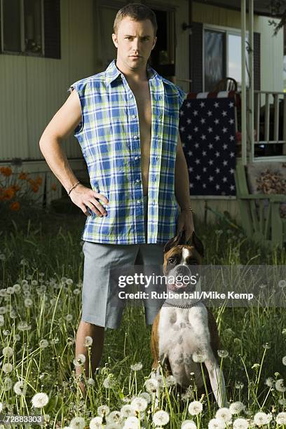 man in trailer park with dog - hillbilly stock pictures, royalty-free photos & images