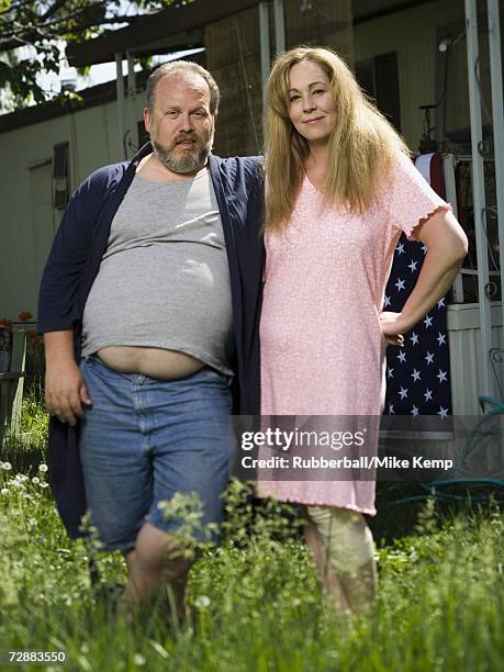 overweight couple in a trailer park - redneck women stock pictures, royalty-free photos & images