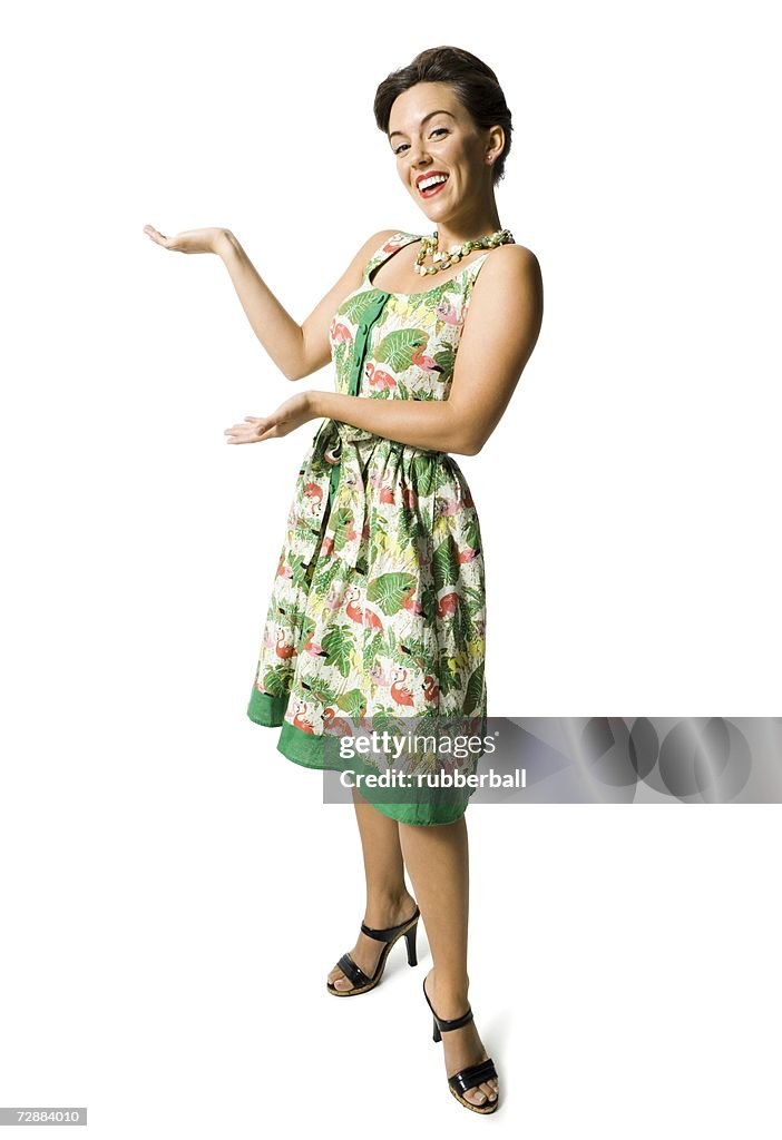 Woman in floral dress gesturing