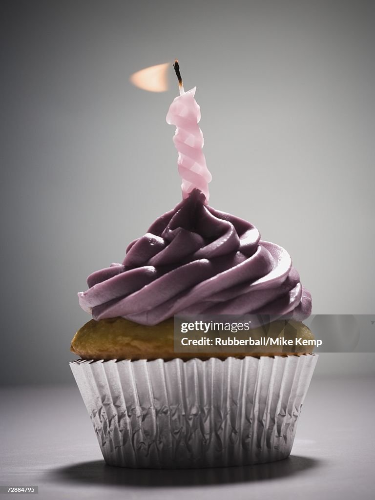 Cupcake with one birthday candle