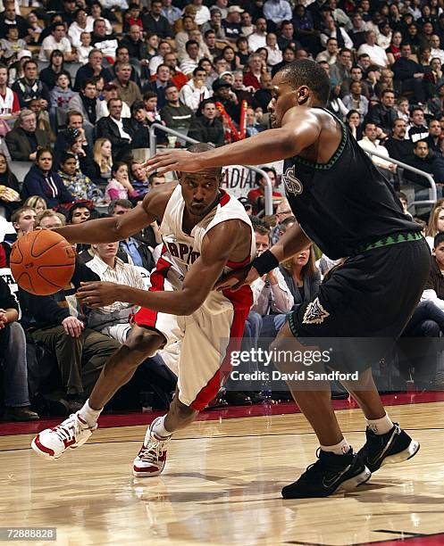 Ford of the Toronto Raptors drives to the net past Randy Foye of the Minnesota Timberwolves on December 27, 2006 at the Air Canada Centre in Toronto,...