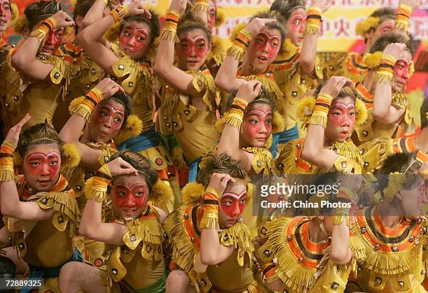 Students of an opera school dance during a performance about the "Monkey King" to celebrate the upcoming New Year on December 27, 2006 in Beijing,...