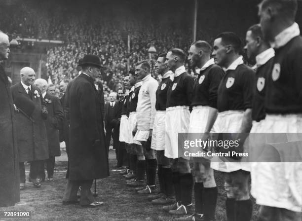 King George V meeting the Arsenal team before the 1960 F A Cup final at Wembley Stadium, 26th April 1930. Arsenal won the match against Huddersfield...