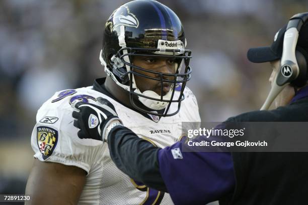 Linebacker Adalius Thomas of the Baltimore Ravens talks with defensive coordinator Rex Ryan on the sideline during a game against the Pittsburgh...