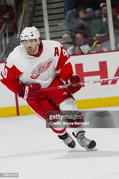Henrik Zetterberg of the Detroit Red Wings skates against the New Jersey Devils on December 16, 2006 at Continental Airlines Arena in East...
