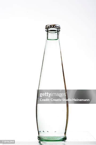 bellied bottle of water, close-up - drinking glass bottle stock pictures, royalty-free photos & images