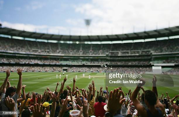 Mexican wave circulates through the crowd during the fourth Ashes test at the Melbourne Cricket Ground on December 28, 2006 in Melbourne, Australia....