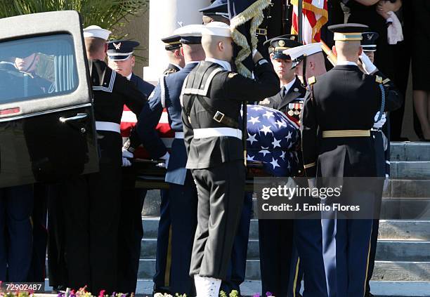 Members of the Armed Forces carry the body of the late Former U.S. President Gerald R. Ford for a private ceremony with family members at Saint...