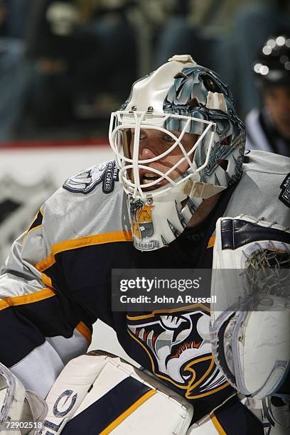 Chris Mason of the Nashville Predators eyes the puck against the St. Louis Blues at Gaylord Entertainment Center on December 16, 2006 in Nashville,...