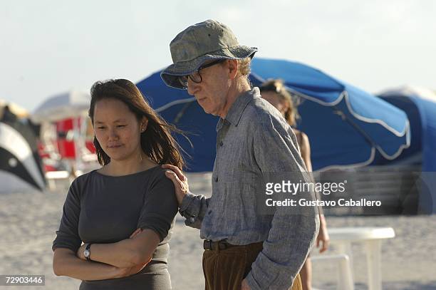 Woody Allen and wife Soon Yi Previn watch their children play on the beach on December 29, 2006 in Miami Beach , Florida.