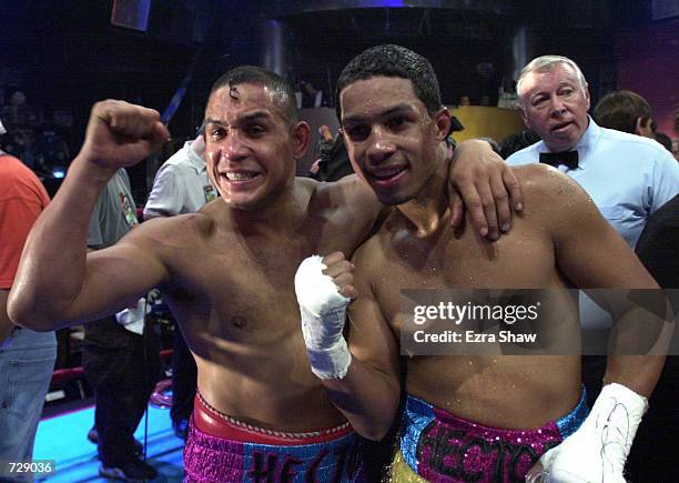 Hector Camacho Sr. And Hector Camacho Jr. Celebrate after they both won their bouts during Mucho Macho Madness at the Level Club in Miami, Florida....