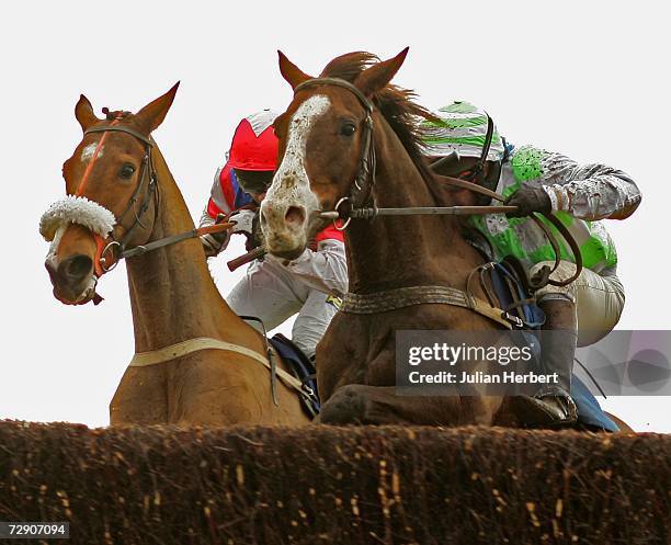 William Kennedy and Passenger Omar clear the last fence in company with the Matty Batchelor ridden Iris De Balme to land The Warwick Beginners...