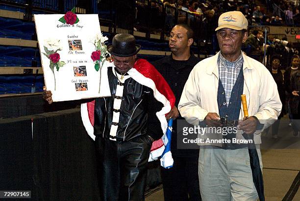 Fan gets emotional after viewing the body of music legend, James Brown, on December 30, 2006 in Augusta, Georgia. Thousands of fans and friends paid...
