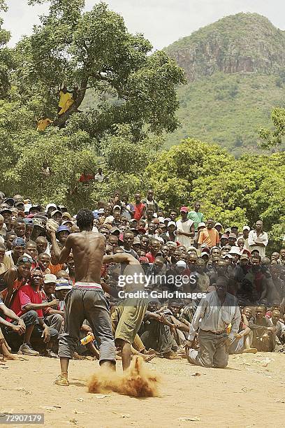 Rudzi Ramabulana and Pfano Livhuwani fight during a traditional fist fighting match on December 29, 2006 in Tshaulu Village, Venda, South Africa....