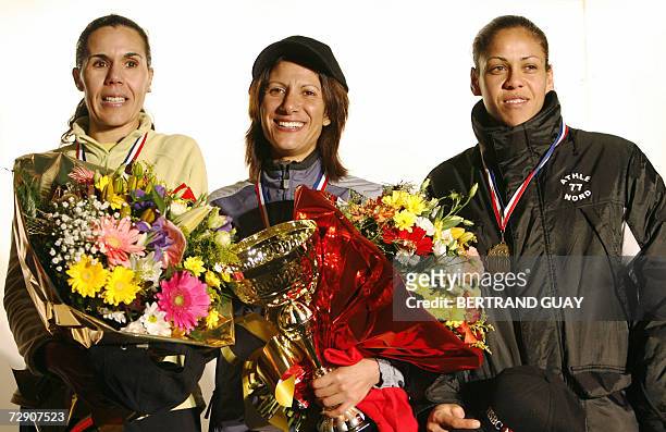 Bahrain's Nadia Ejjafini poses on the podium of the 35th edition of the 10.000 meters pedestrian corrida of Houilles, 31 December 2006. She won the...