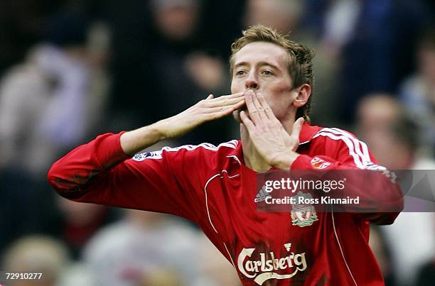 Peter Crouch of Liverpool celebrates scoring the first goal during the Barclays Premiership match between Liverpool and Bolton Wanderers at Anfield...