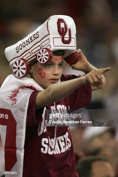 An Oklahoma Sooners fan points at the Tostito's Fiesta Bowl against the Boise State Broncos at University of Phoenix Stadium January 1, 2007 in...