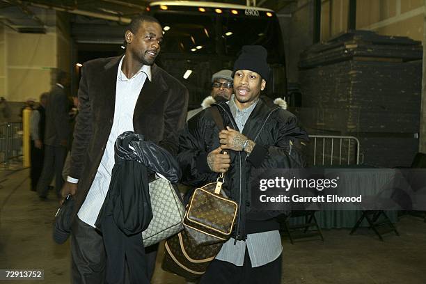 Allen Iverson of the Denver Nuggets and Chris Webber of the Philadelphia 76ers arrive to the game at the same time at the Pepsi Center January 2,...