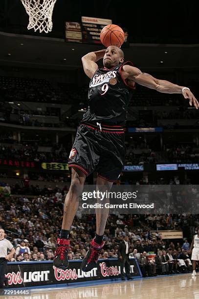 Andre Iguodala of the Philadelphia 76ers goes up for a dunk against the Denver Nuggets January 2, 2007 at the Pepsi Center in Denver, Colorado. The...