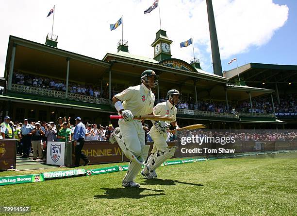 Australian openers Matthew Hayden and Justin Langer run out to bat during day two of the fifth Ashes Test Match between Australia and England at the...