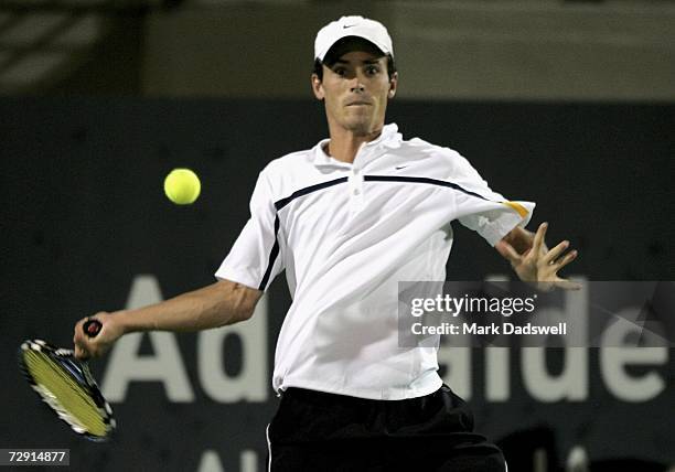 Alun Jones of Australia plays a forehand in his match with Novak Djokovic of Serbia during day four of the 2007 Next Generation Adelaide...