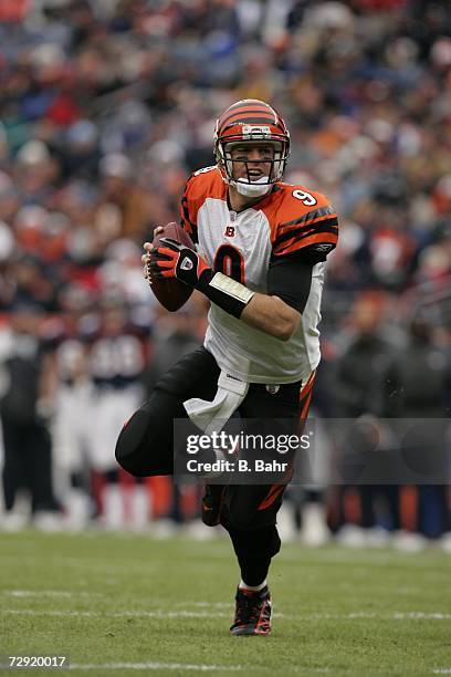 Quarterback Carson Palmer of the Cincinnati Bengals rolls out to throw against the Denver Broncos in the first quarter on December 24, 2006 at...