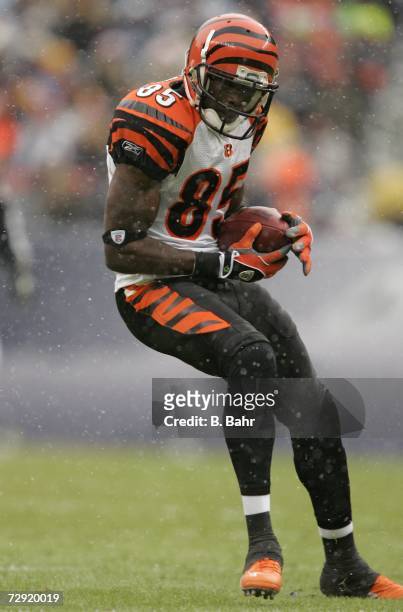 Wide receiver Chad Johnson of the Cincinnati Bengals grabs a a pass against the Denver Broncos on December 24, 2006 at Invesco Field at Mile High in...