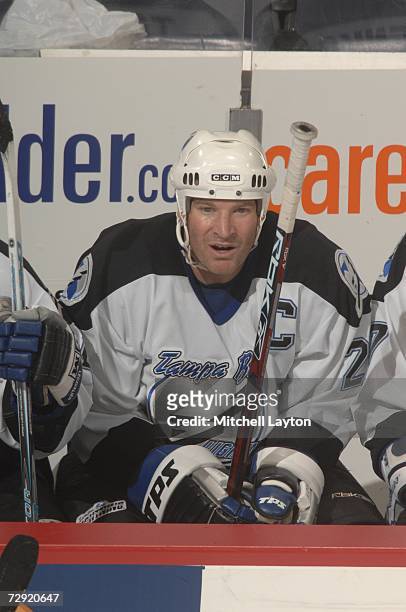 Tim Taylor of the Tampa Bay Lightning looks on against the Washington Capitals at Verizon Center on December 19, 2006 in Washington, D.C. The...