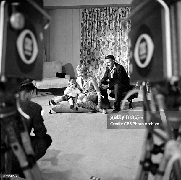 American actress and entertainer Shirley MacLaine poses with her husband, Steve Parker, and their daughter, Sachi Parker, in their home on an episode...